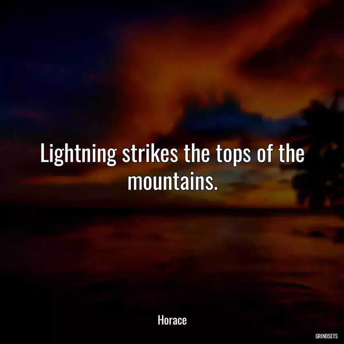 Lightning strikes the tops of the mountains.