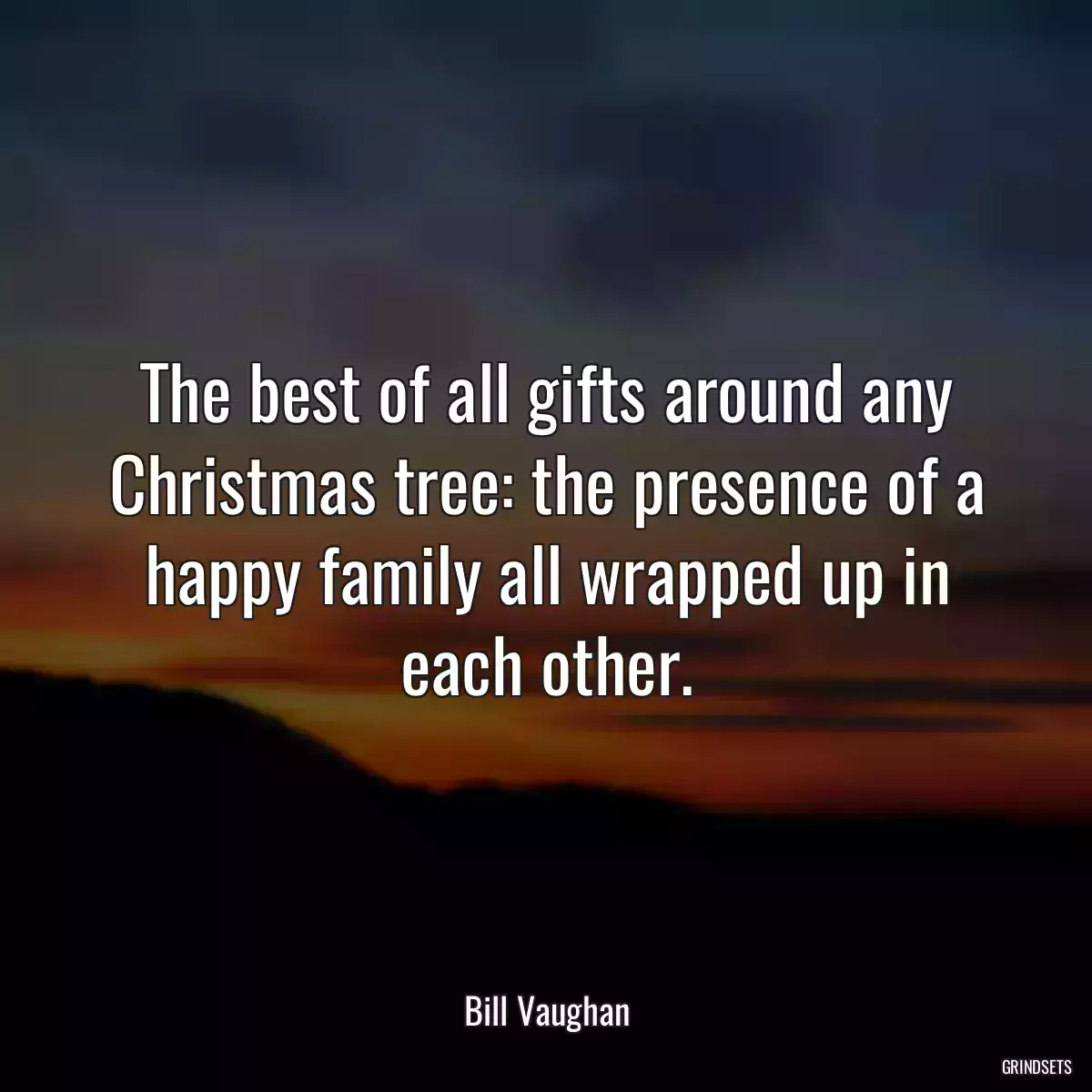 The best of all gifts around any Christmas tree: the presence of a happy family all wrapped up in each other.